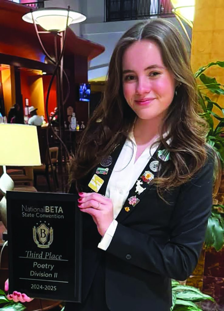 Callie Wood Virginia Sr. Beta President with her Poetry Award.