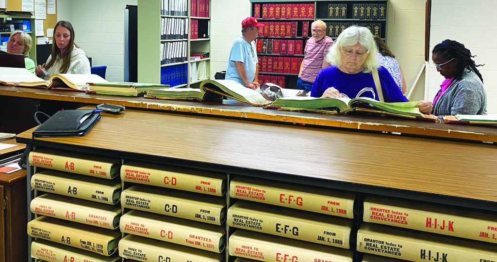 Participants researched in the vault at the Register of Deeds Office during the family history conference last year.