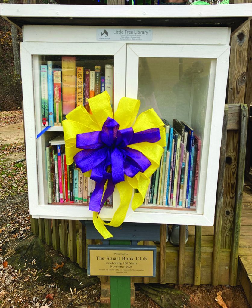 The Little Free Library was designed and built by Jim C. Churchwell of Jim’s Creations.