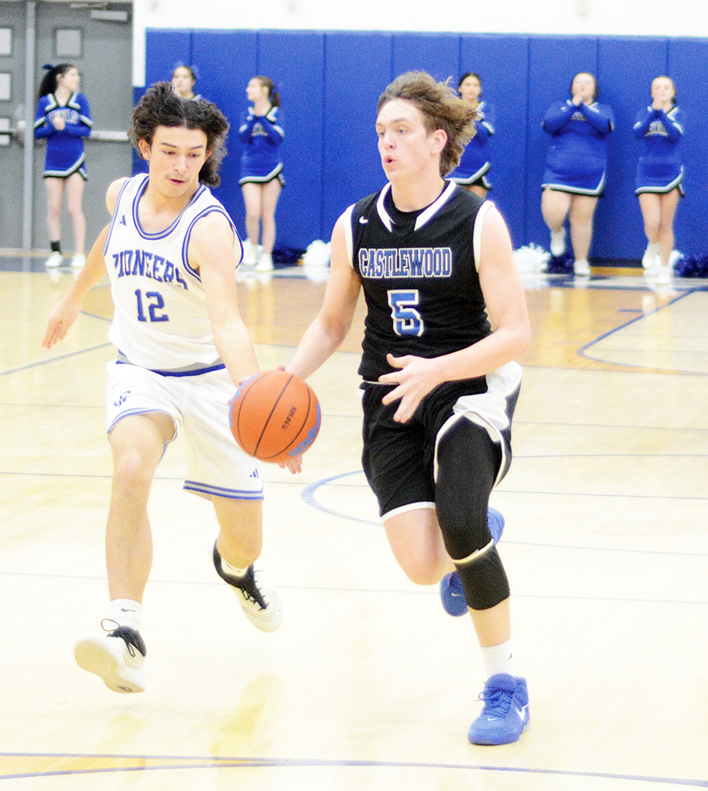 Tru Ruff (5) moves the ball up the floor against Thomas Walker. Ruff will be the only returning starter on the hardwood 