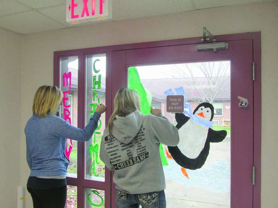 Students Paint Window – Clay County Free Press