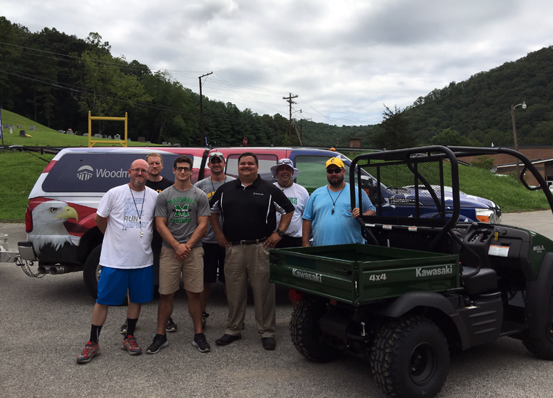 Company donates vehicle to Clay football team