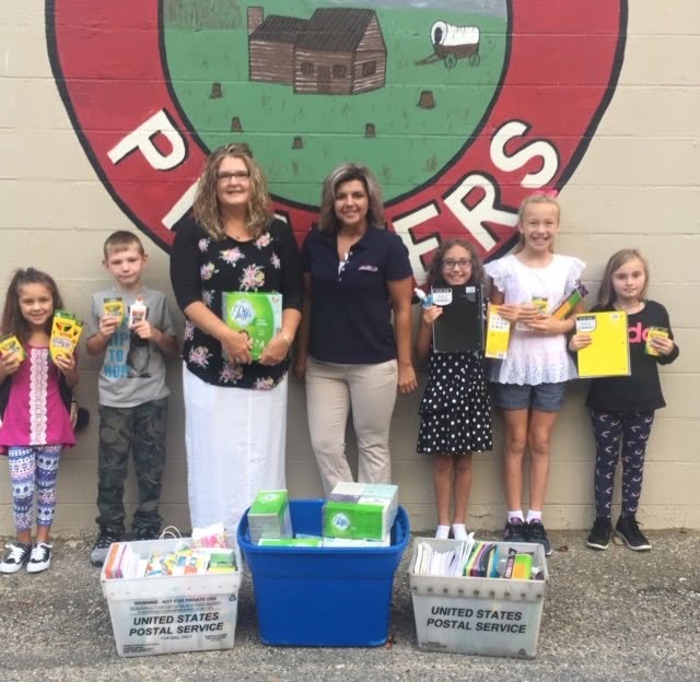 Poca Valley Bank donates school supplies to H.E White Clay County