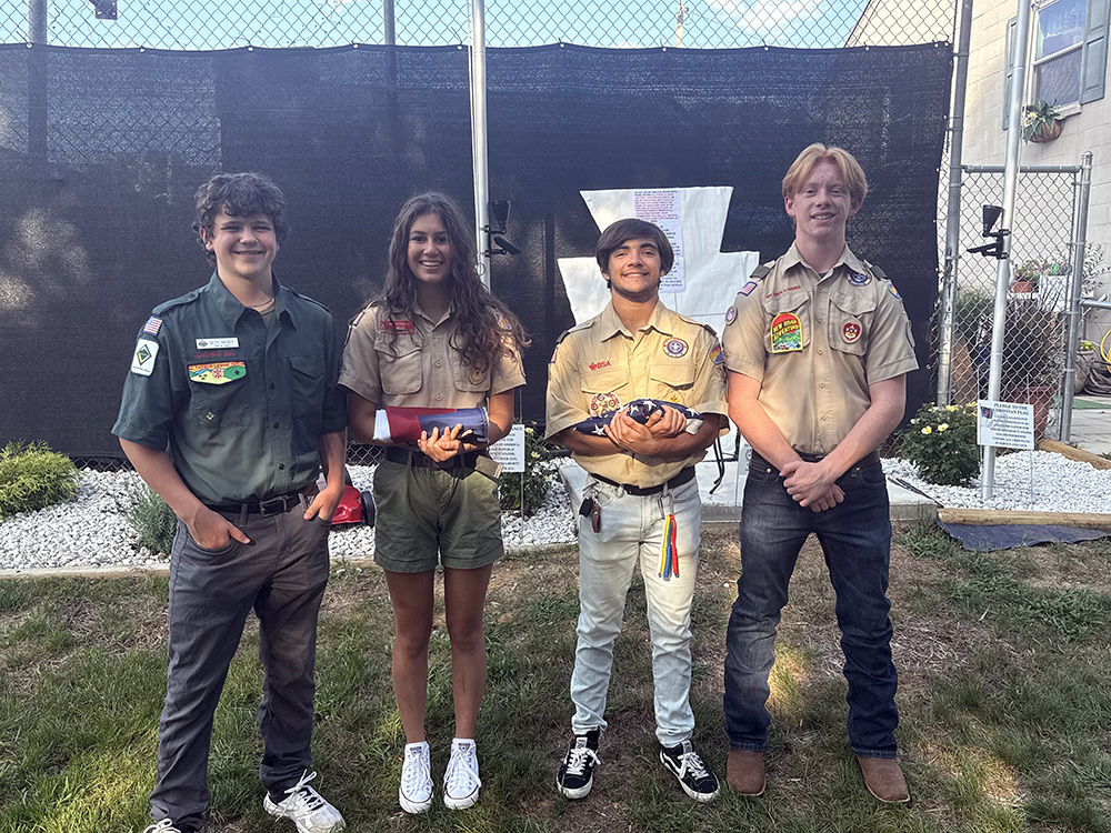 Glenvar teen erects flagpoles for Eagle Scout project