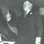Photo of Thomas P. McCoy mid-speech