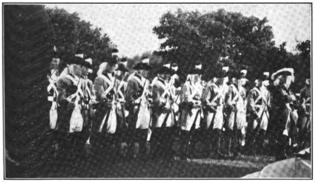 Photo of reenactors dressed in Revolutionary War Uniforms likely French