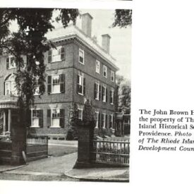 Excerpt from the article, featuring a black and white photo of the John Brown House