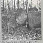 Black and white photograph of John Hudson at Queens Chamber at Queens Fort, North Kingstown, R.I., taken from article