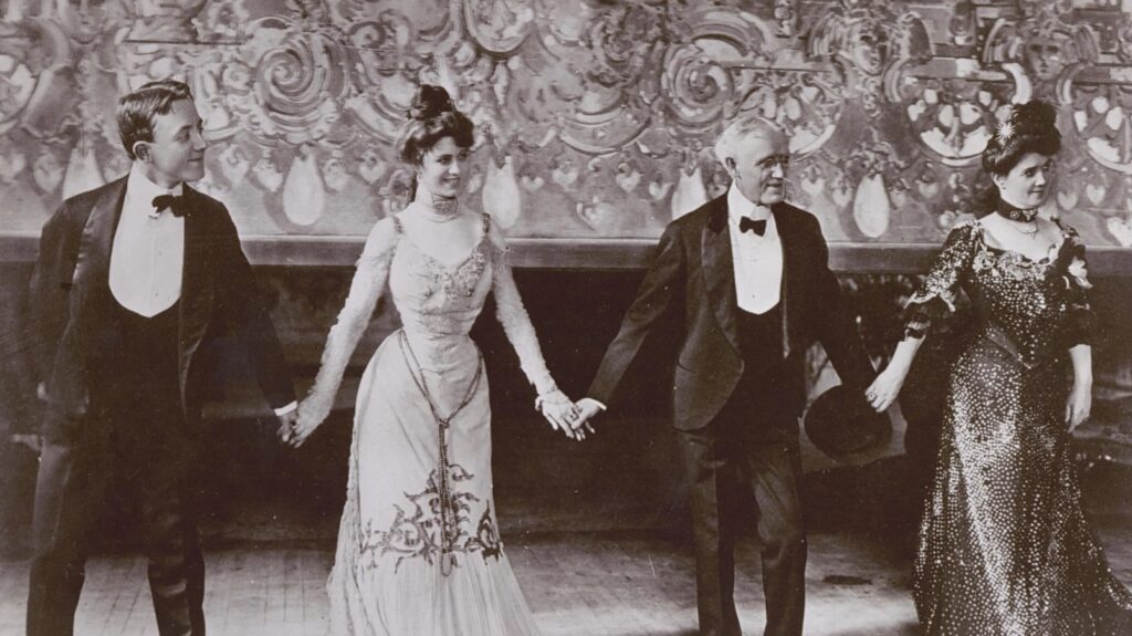 Black and white photograph of George, his sister Josie, and their parents, Mr.& Mrs. Cohan.