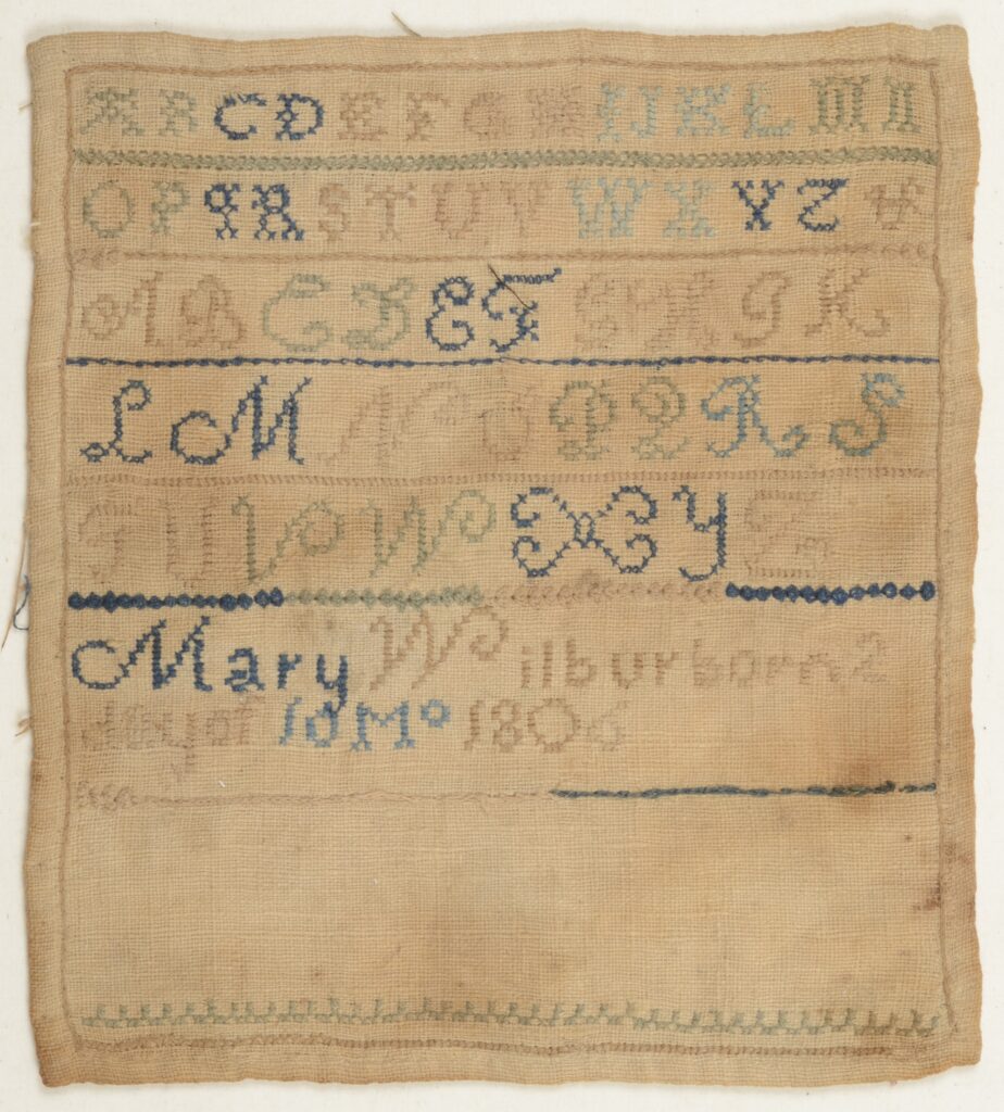 Color image of Mary Wilbur's sampler, 1816, featured on page 39 of the article