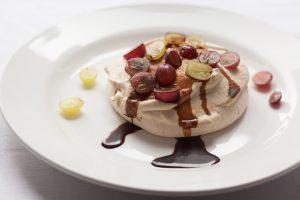 masticha meringue with petimezi cream and grapes - ancient Greek ingredients dessert