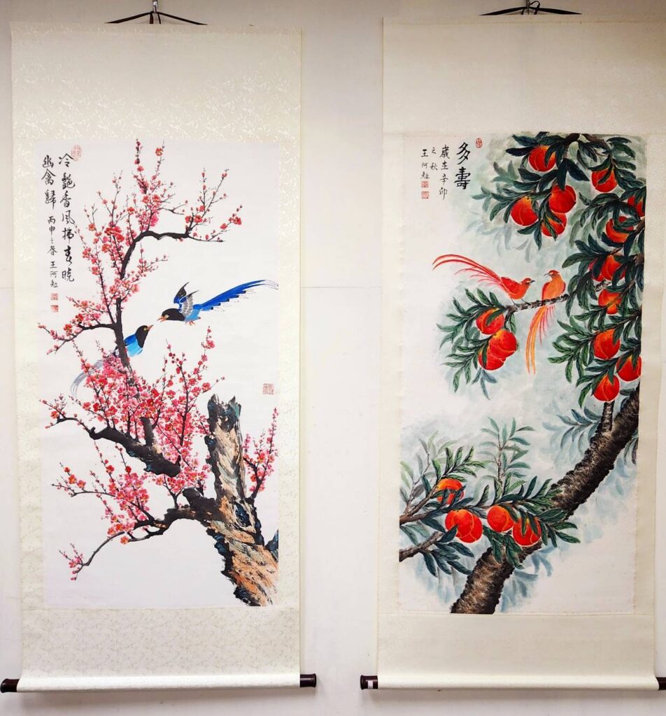 ▲花鳥的互動傳情,彰顯出王阿勉老師在工筆水墨功底的獨到之處。(記者 辛澎祥/攝)