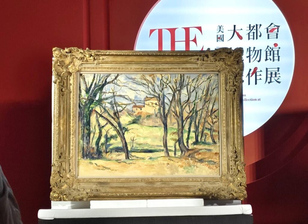 塞尚的「布豐莊園附近的樹木與房舍」開箱。(記者 陳安婷/攝)