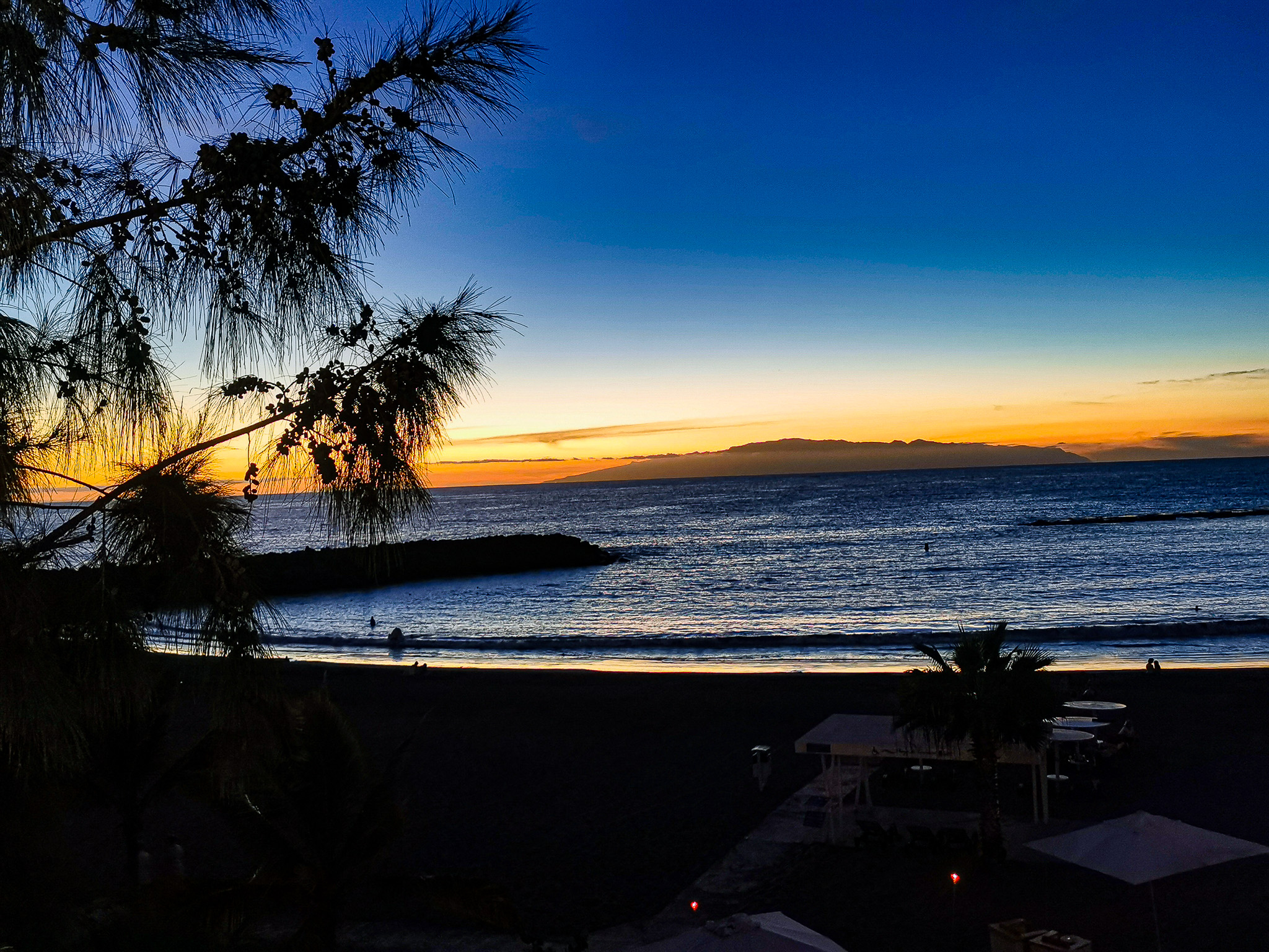 a sunset shot of sa beach location in tenerife