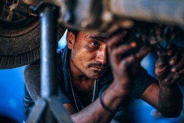 Mechanic Under Forklift