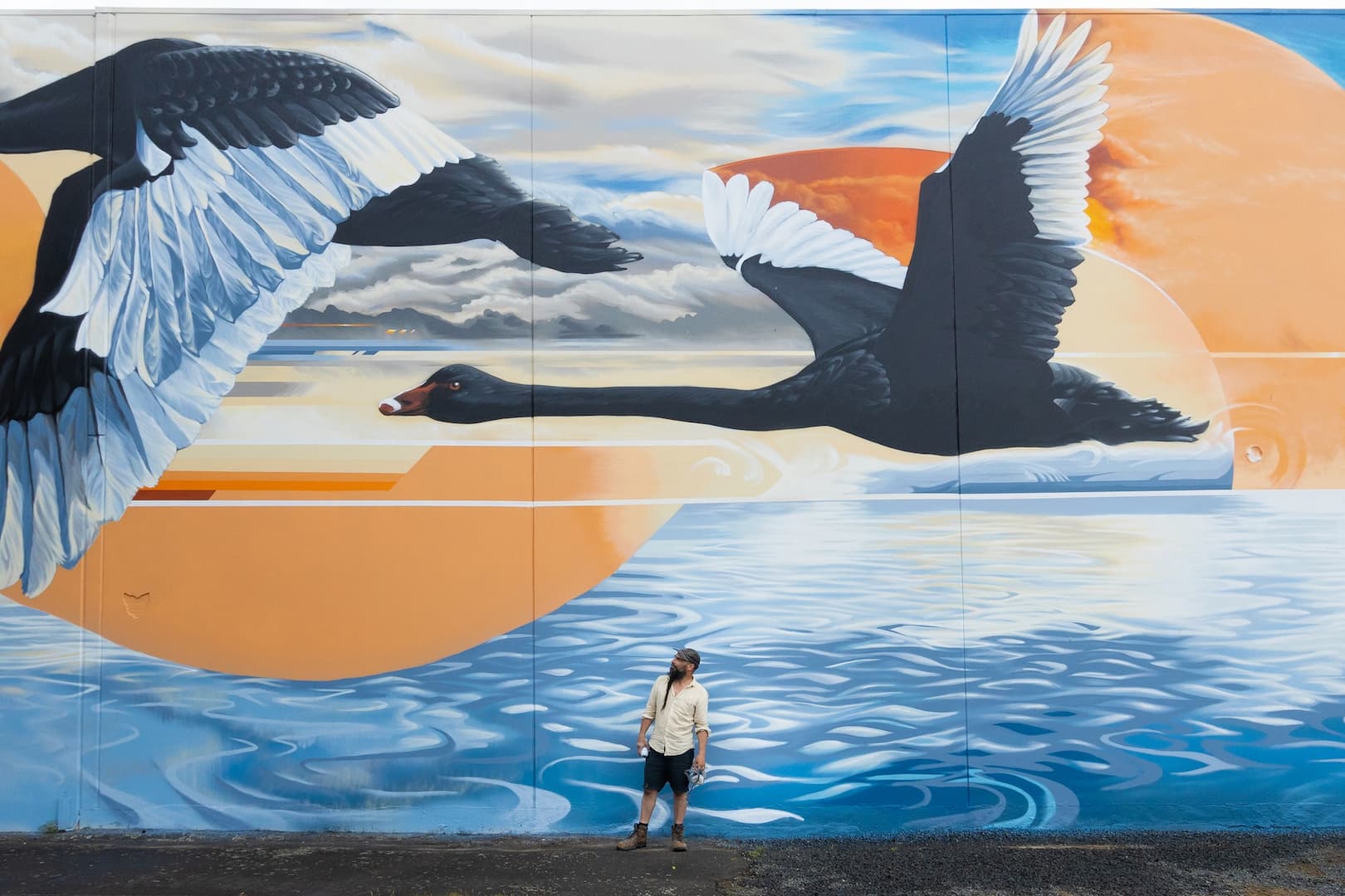 Jamin and his mural at Black Swan Park