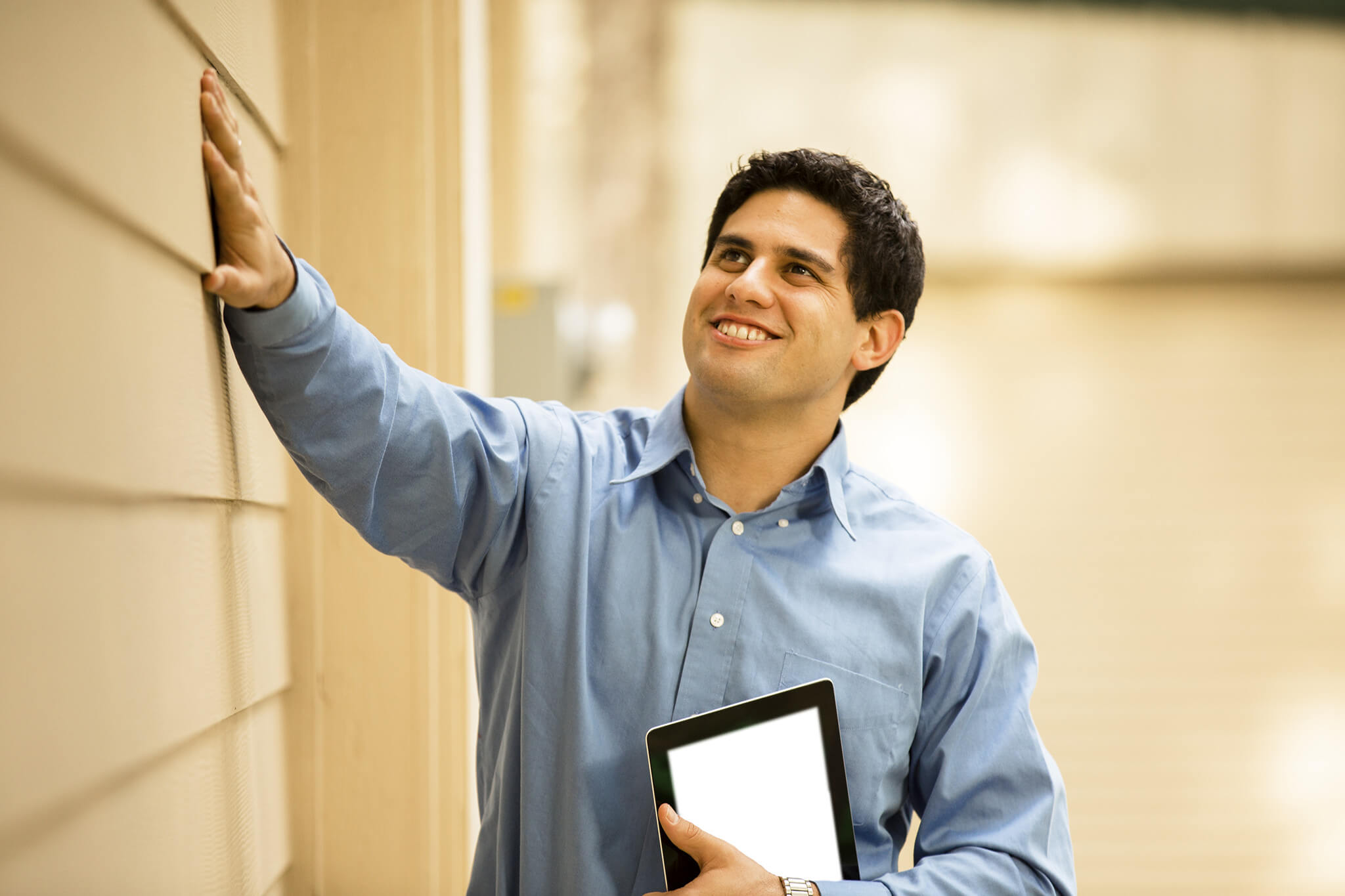 property manager inspecting windows