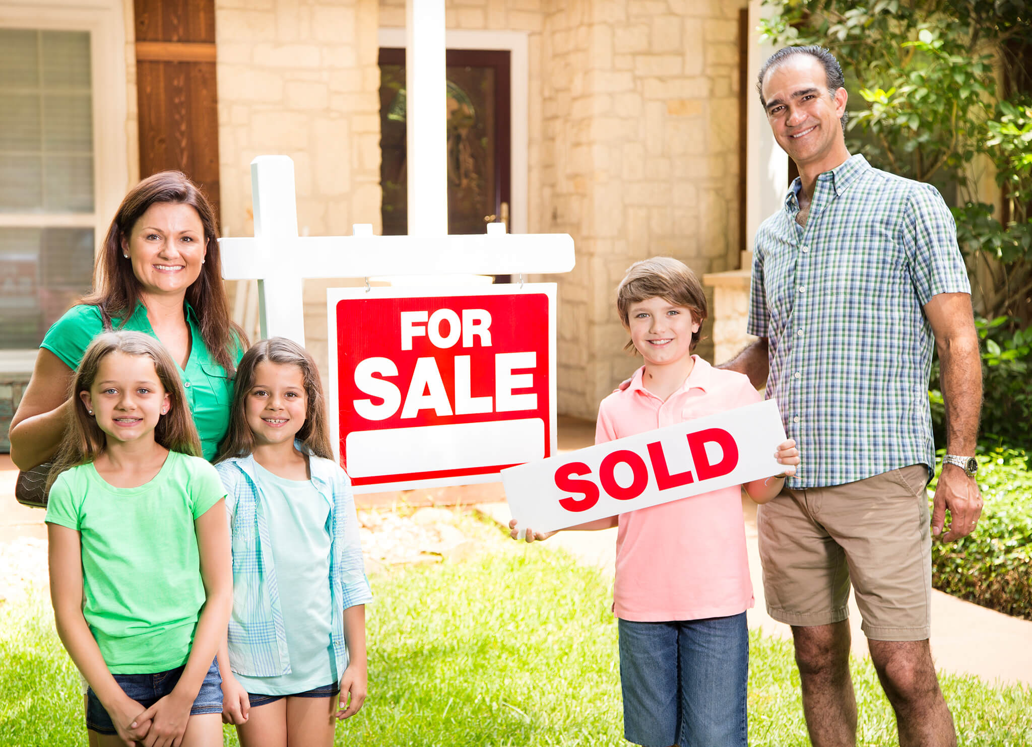 family happy at their new home