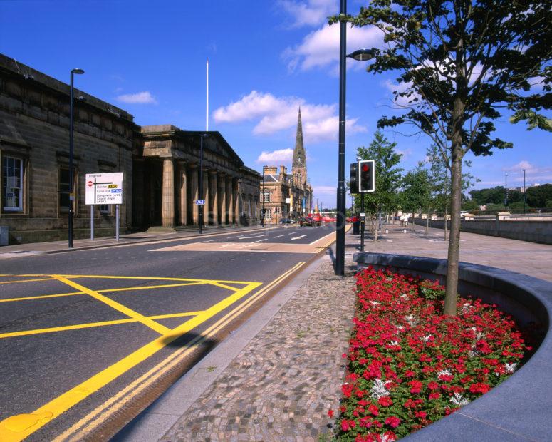 Looking Along Tay Street With Classical Buildings And River Tay Perth