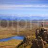 Tourists At Dramatic Viewpoint At Storr Isle Of Skye