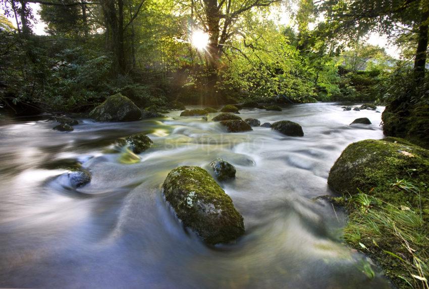 0I5D1464 Evening Sunlight Reflects On Flowing River Sutherlands Glen