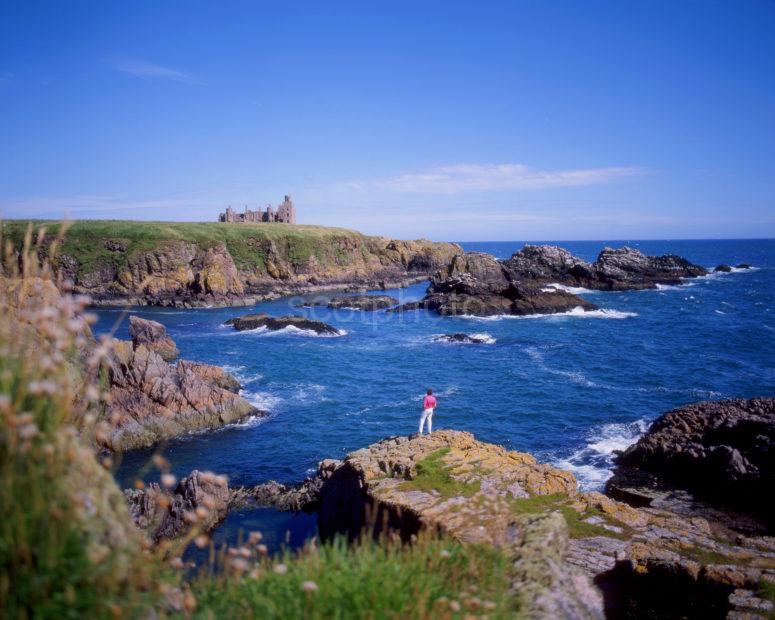 Rugged Coastline With Slains Castle Cruden Bay Aberdeenshire