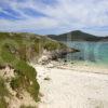 Beach On Vatersay With Castlebay In Distance