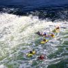 Canoes Ride The Rapids At Falls Of Lora