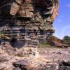 Honeycomb Weathered Cliffs At Elgol With Croft Island Of Skye