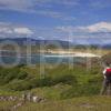 Hiker Towards Eigg And Rum From Sanna Bay