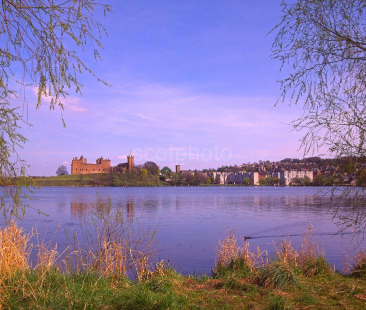 A Pleasant Springtime View From The Shore Of Linlithgow Loch Towards Linlithgow And The Palace Midlothian