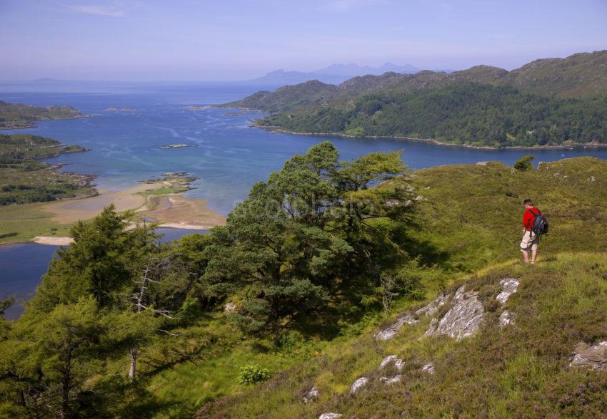 Hiker Above Loch Moidart With Rhum And Eigg