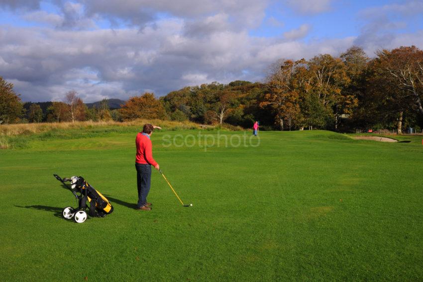 Couple On Eriska Course At 9th Hole