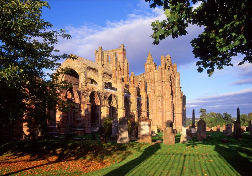 Evening Light On Ruins Of Melrose Abbey Scottish Borders