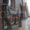 Busker In Mathew Street Nr John Lennon Statue