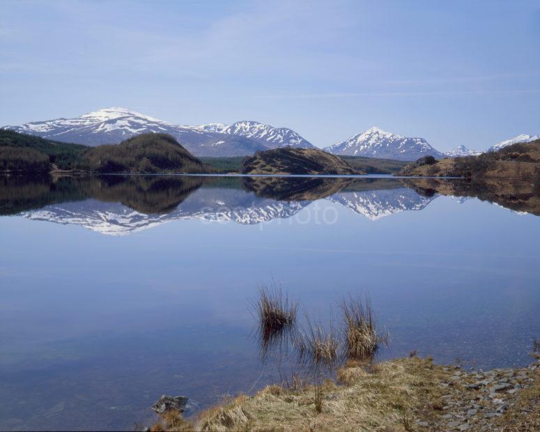 Peaceful Winter Reflections On Loch Moy