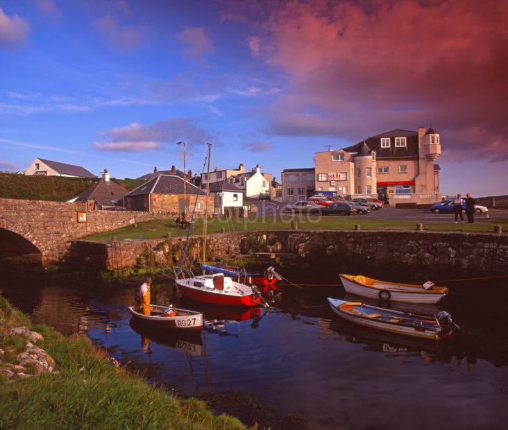 Evening Light Illuminates The Tiny Hamlet Of Blackwaterfoot On The Island Of Arran