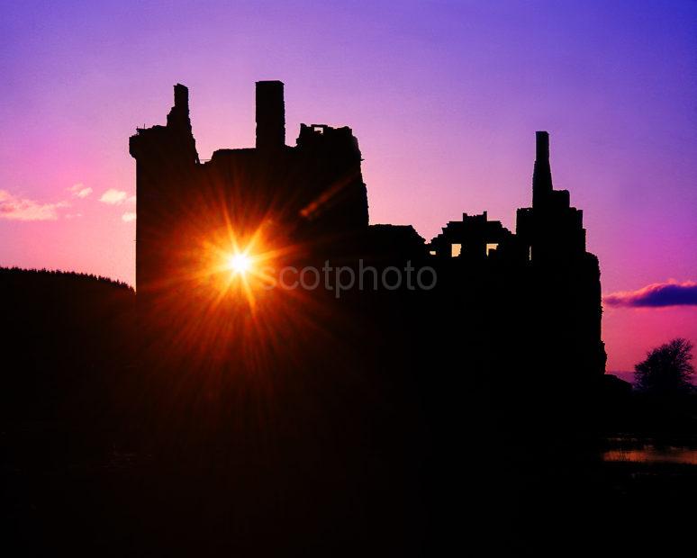 Starburst Sunset Through Kilchurn Castle Ruins Loch Awe