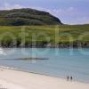 Walkers On A Beach On Vatersay