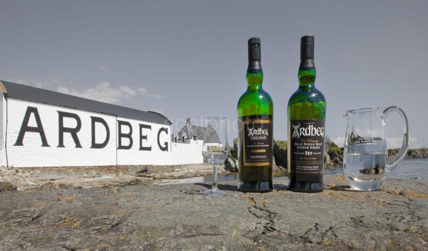 I5D0765 Ardbeg Distillery With Bottles Of Whiskey On Rocks Altered State