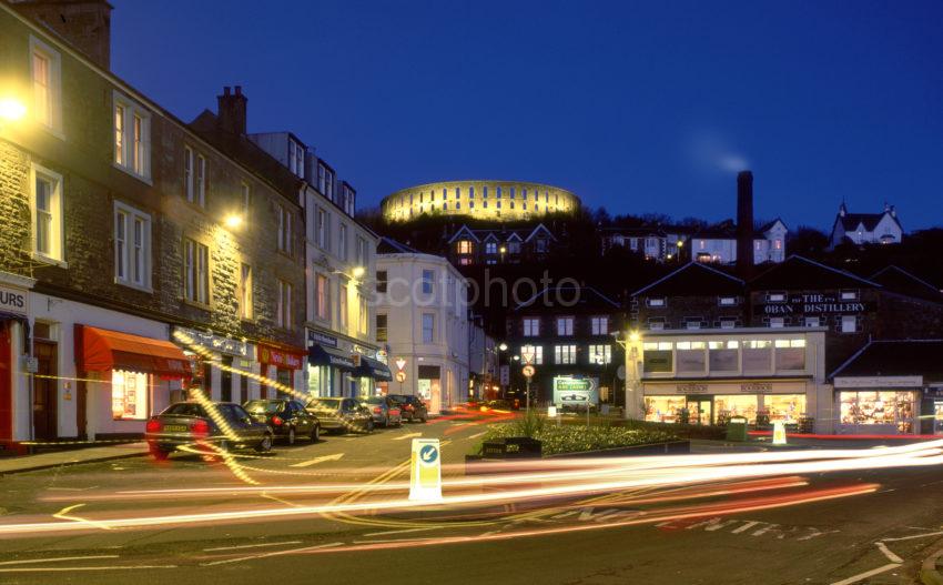 Oban At Night With MacCaigs Tower