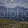 I5D6923 Tourists Admire View Towards Rum From Sanna Ardnamurchan