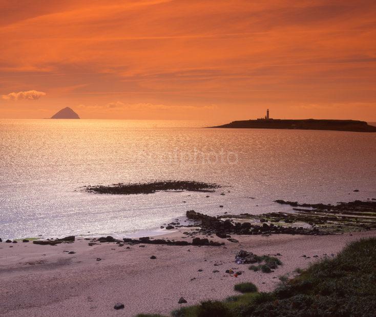 Coastal View From The South Coast Of Arran Towards Pladda Lighthouse And Distant Ailsa Craig Kildonan Isle Of Arran