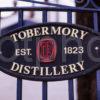 Tobermory Whiskey Distillery Sign On Gate