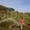 Tourist Enjoys Dramatic View From Quiraing To Storr Rock Staffin Skye