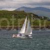 DSC 9202 YACHT SAILS PAST THE NORTH END OF KERRERA IN OBAN BAY