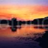 Dramatic Sunset Afterglow Over Castlebay And Kisimul Castle Barra