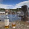 I5D1494 Oban Whisky On North Pier With Town Centre In View Oban