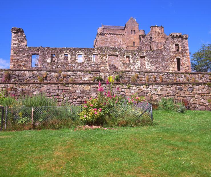 A Colourful Summertime Scene Of Castle Siituated In Picturesque Dollar Glen Clackmannanshire