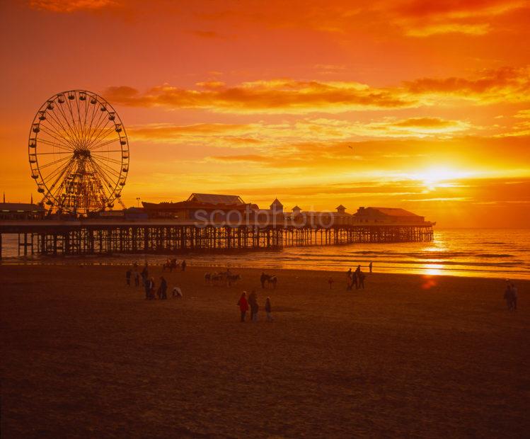 Sunset Across The Sands And Central Pier In Blackpool With The Big Wheel Silhouetted Blackpool Lancashire England